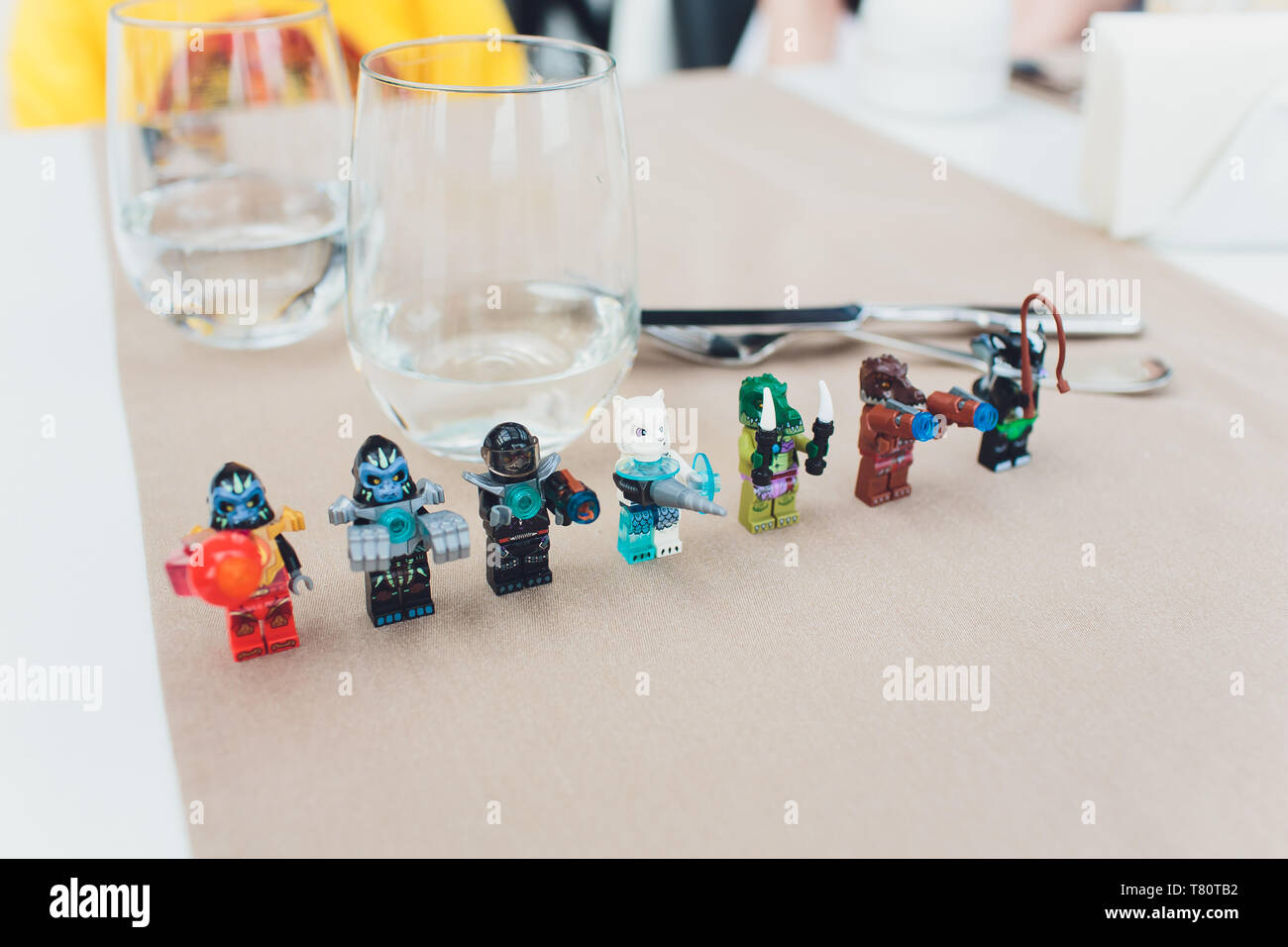 Ufa, Russia - April 11, 2019: Close up image of lego minifigures posing as tradespeople against a food background Stock Photo