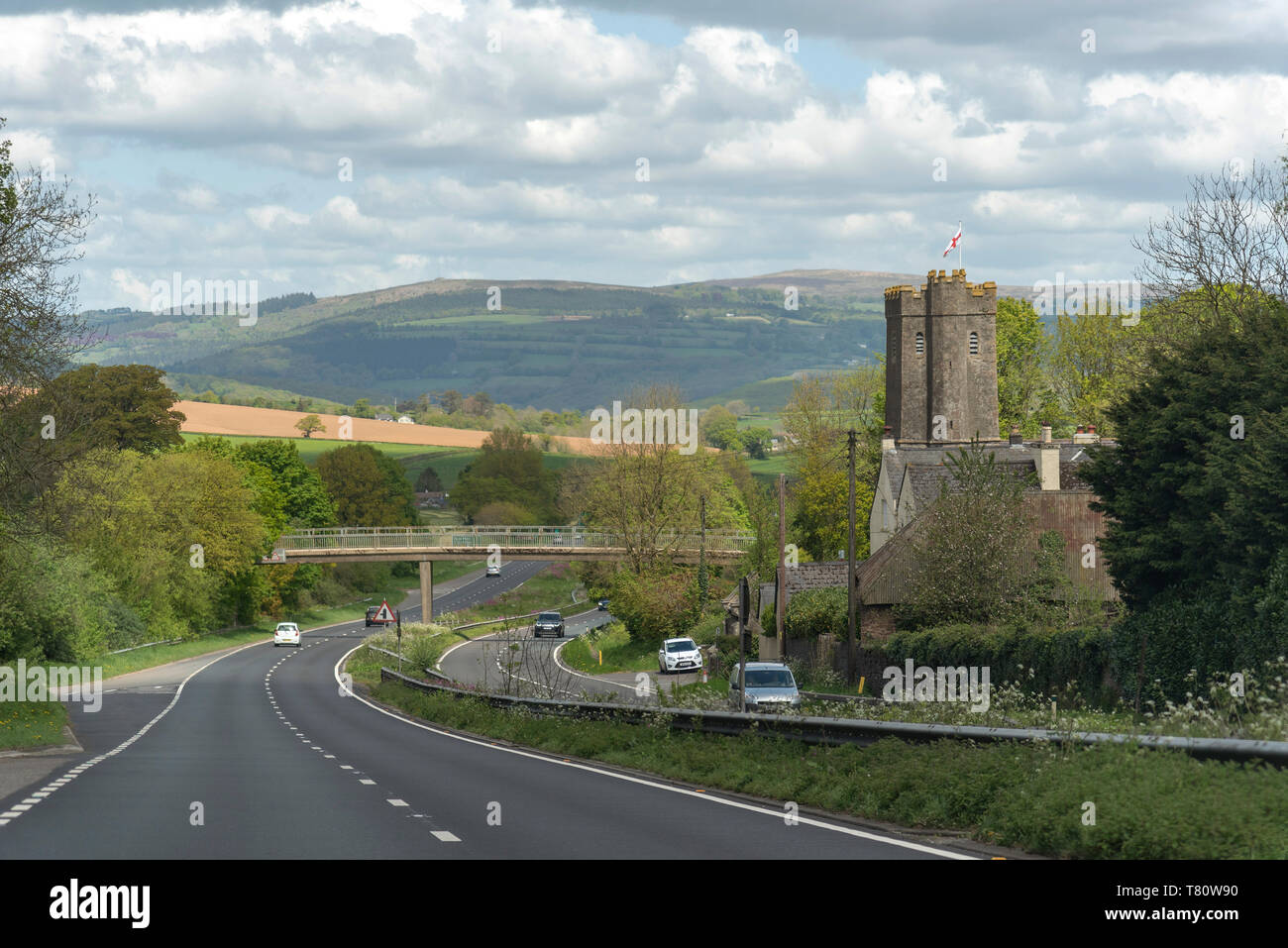 Dean Prior, South Devon, England, UK. May 2019. The A38 Devon Expressway and St George the Marty church overlooked by the Dartmoor National Park. Stock Photo