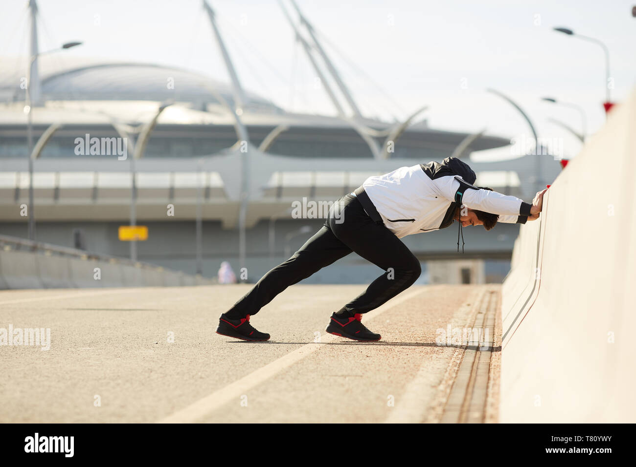 Exercising by border Stock Photo