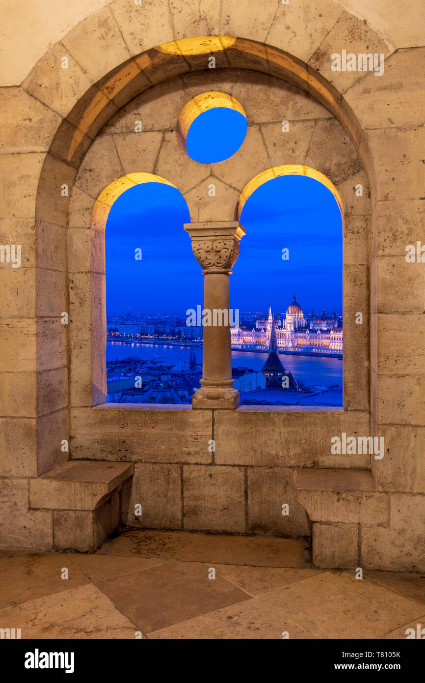 View of the Hungarian Parliament at night, from the stone window at Fisherman's Bastion, UNESCO World Heritage Site, Budapest, Hungary, Europe Stock Photo