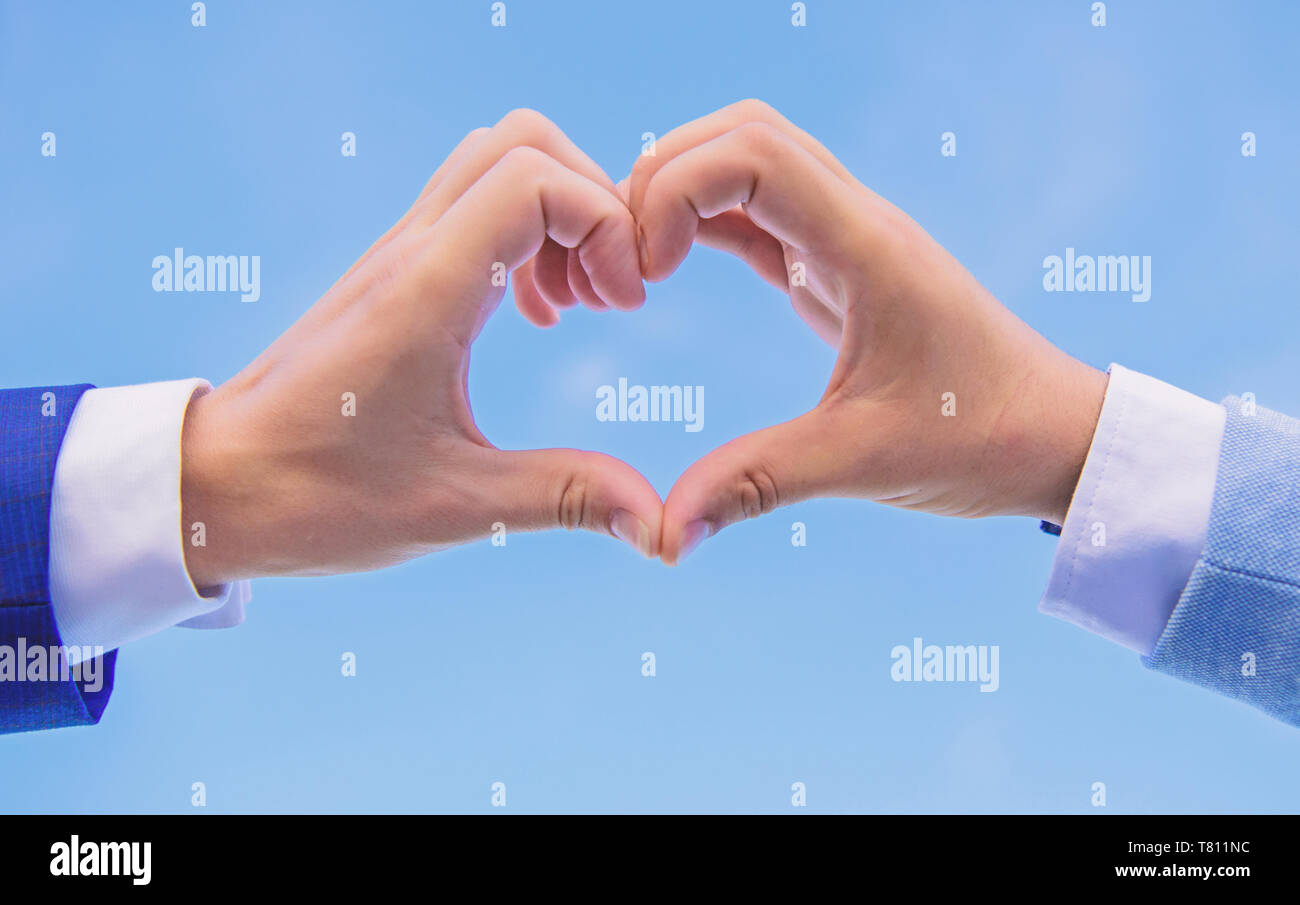 Hands Put Together In Heart Shape Blue Sky Background Hand Heart Gesture Forms Shape Using Fingers Male Hands In Heart Shape Gesture Symbol Of Love And Romance Love Symbol Concept Stock Photo