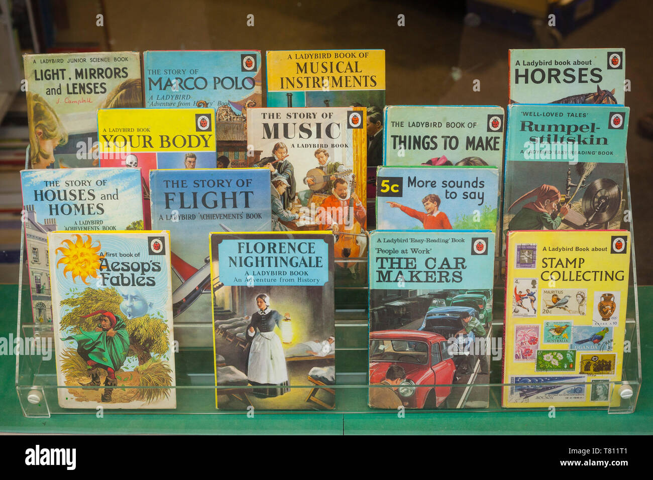 A display of Ladybird children's books in a shop window. Stock Photo