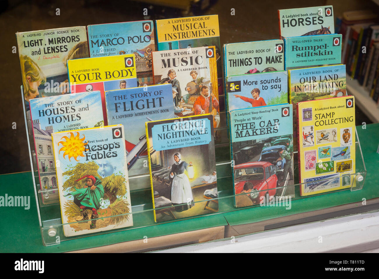 A display of Ladybird children's books in a shop window. Stock Photo