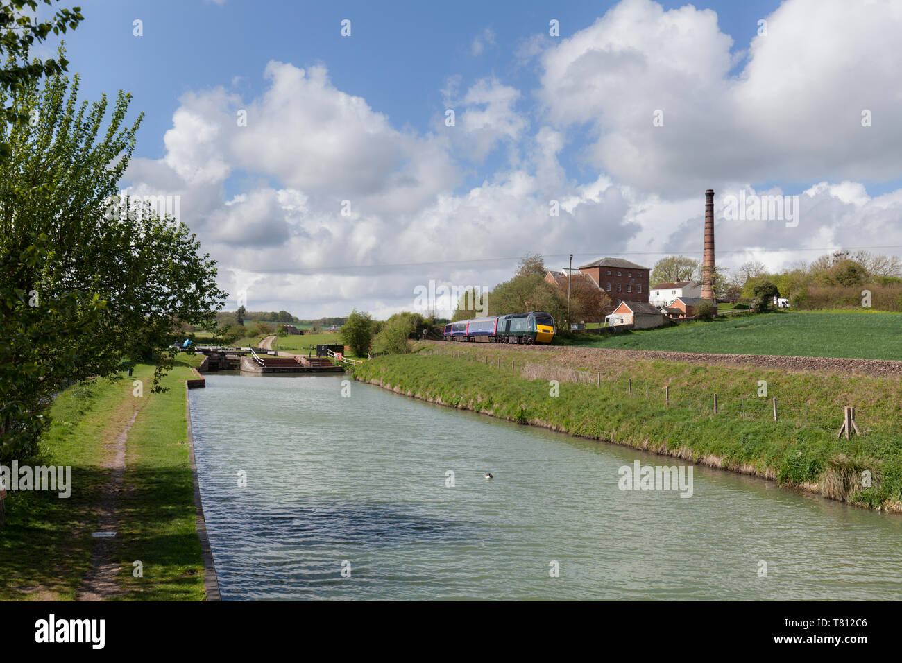 Great Western railway high speed train (Intercity 125) passing Crofton pumping station and the Kennet & Avon canal on the Berks & Hants line Stock Photo