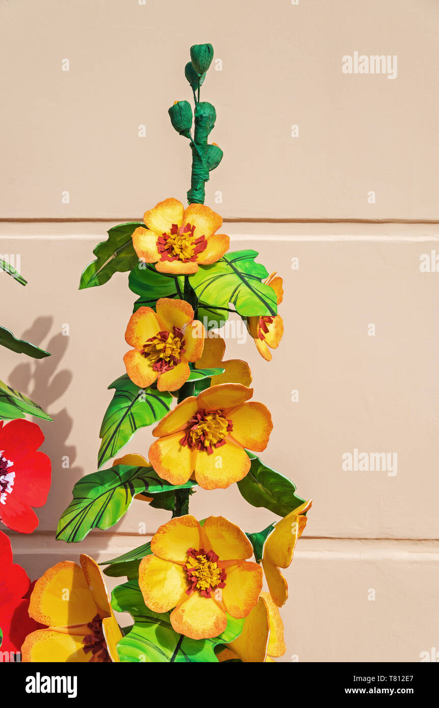 Motley Artificial Flowers Made From Plastic Paper And Fabrics