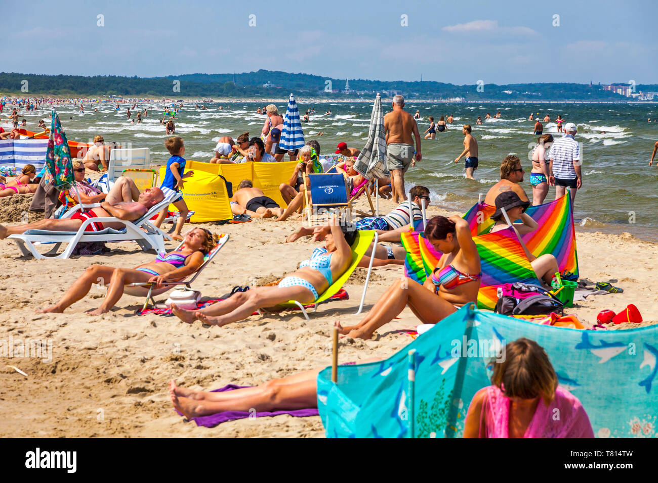 Swinoujscie, Poland - July 7, 2014: People relax on a crowded Baltic sea  beach on Usedom island in Swinoujscie city, Poland Stock Photo - Alamy, image size:1300x956