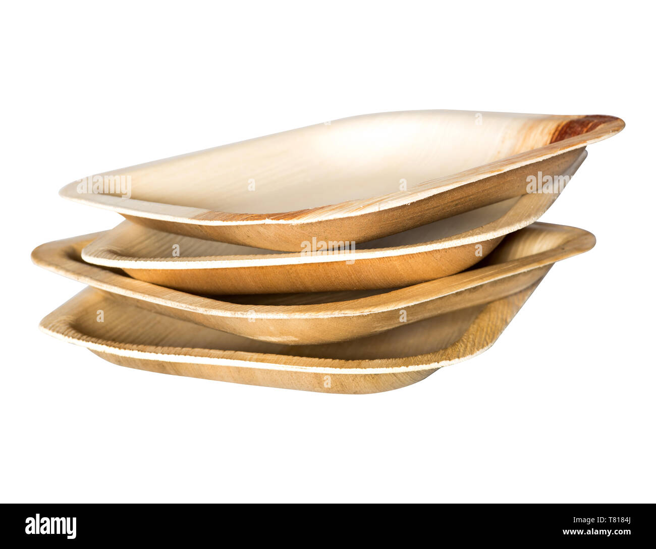 Disposable, compostable, eco friendly, environment friendly wooden palm leaf plates on white background Stock Photo