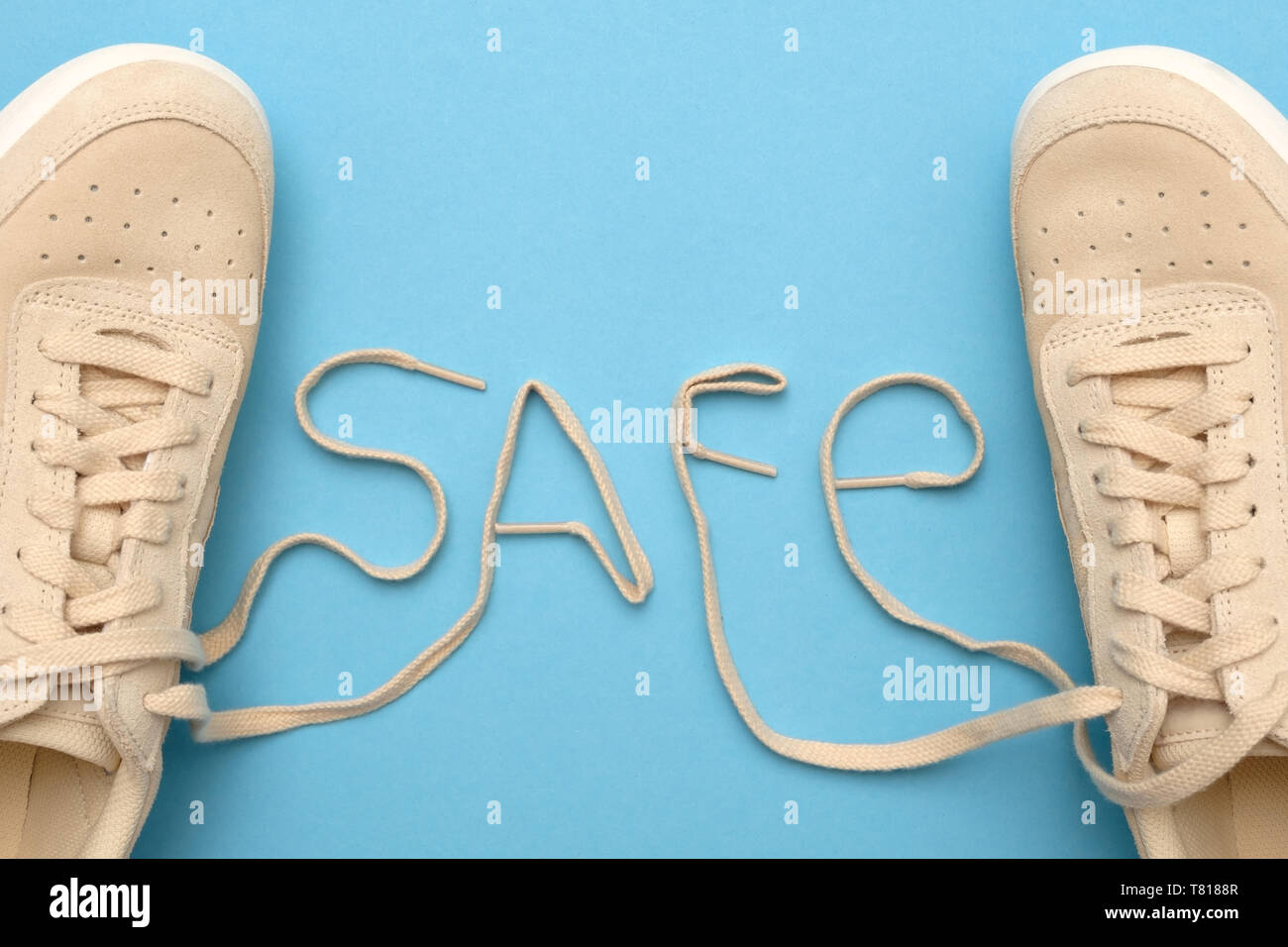 Women sneakers with laces in safe text Stock Photo Alamy