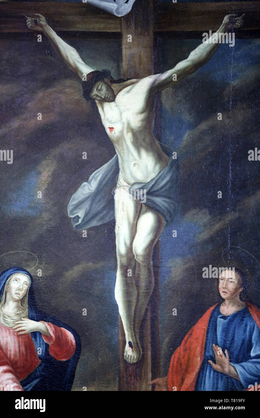 Détails. Crucifixion de Jésus-Christ. Eglise Notre-Dame de l'Assomption. Cordon. Stock Photo