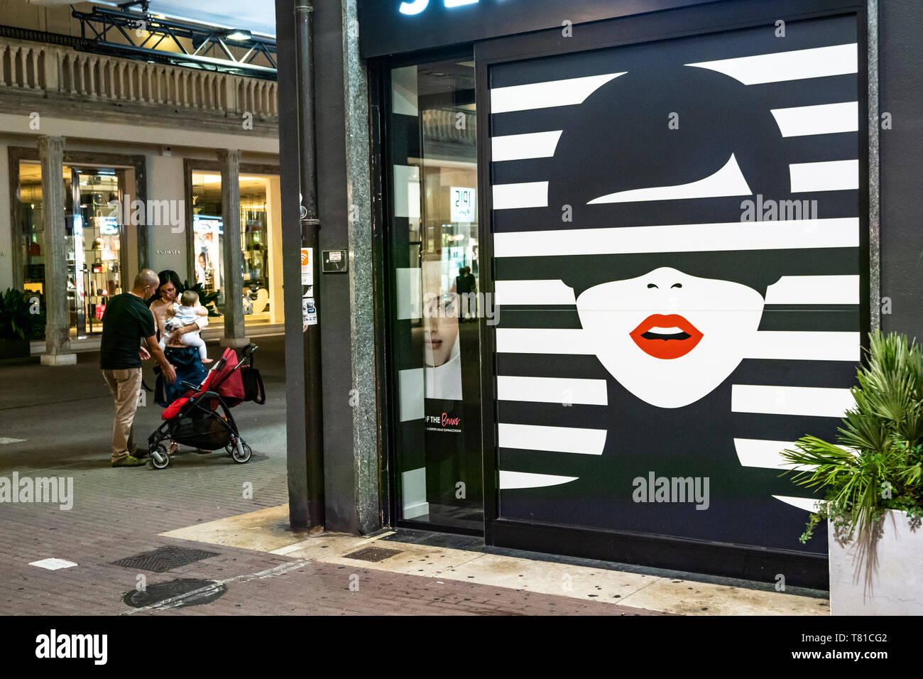 Shop Poster Riccione at night, neat Rimini, Italy Stock Photo
