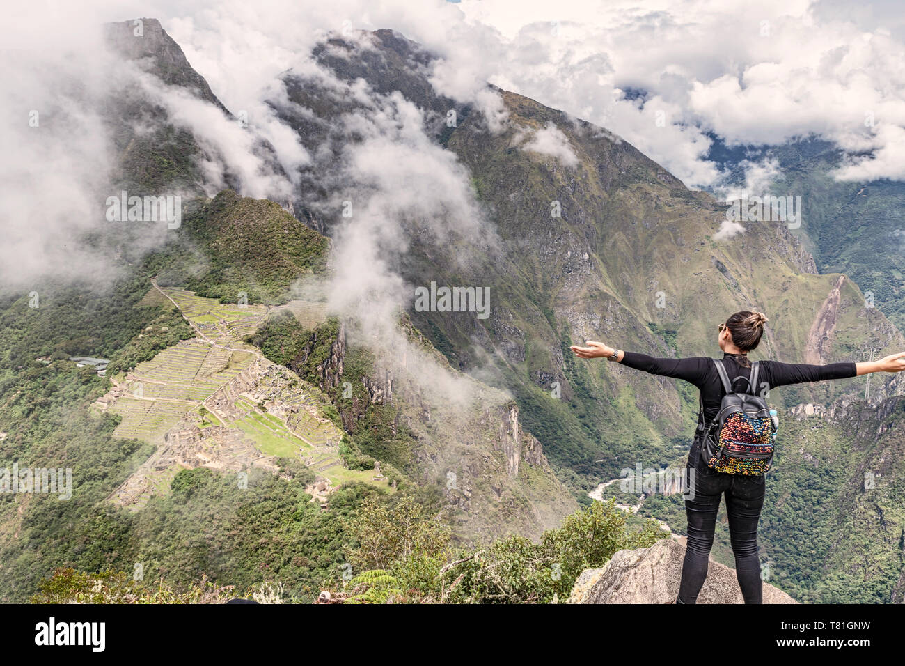 Cusco, Peru – April 6, 2019: Girl standing on the top of Wayna, Huayna ...