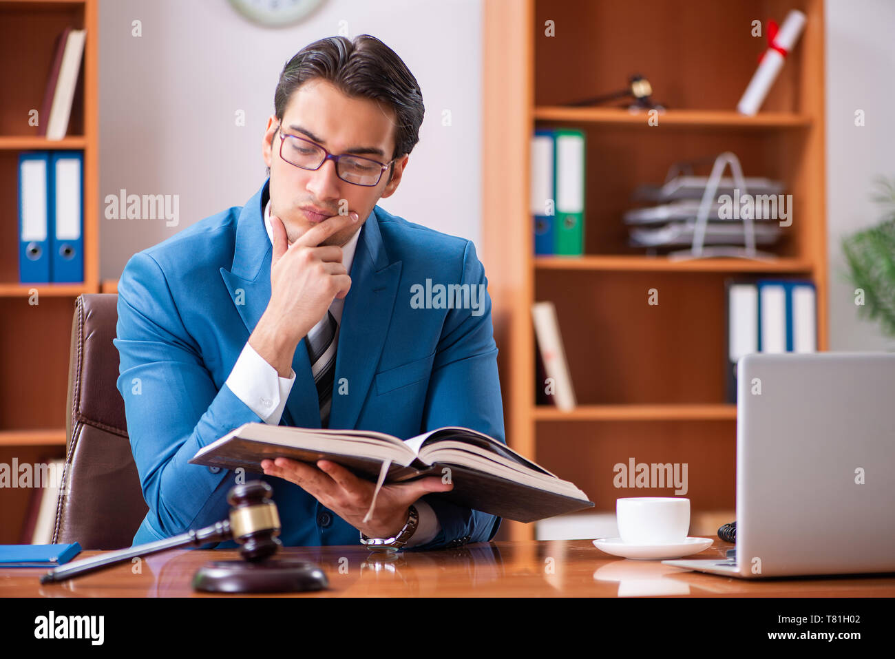 Lawyer working in the office Stock Photo - Alamy