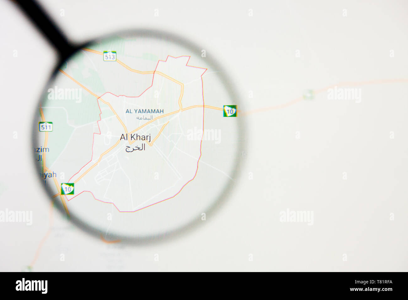 Al Kharj city visualization illustrative concept on screen through magnifying glass Stock Photo