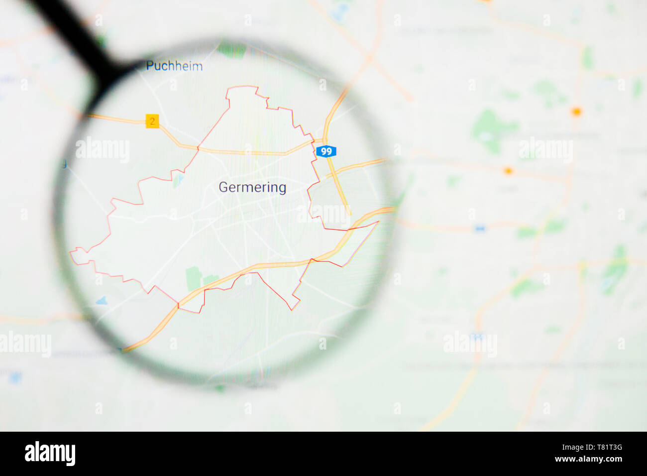 Germering city in Germany, Bavaria visualization illustrative concept on screen through magnifying glass Stock Photo