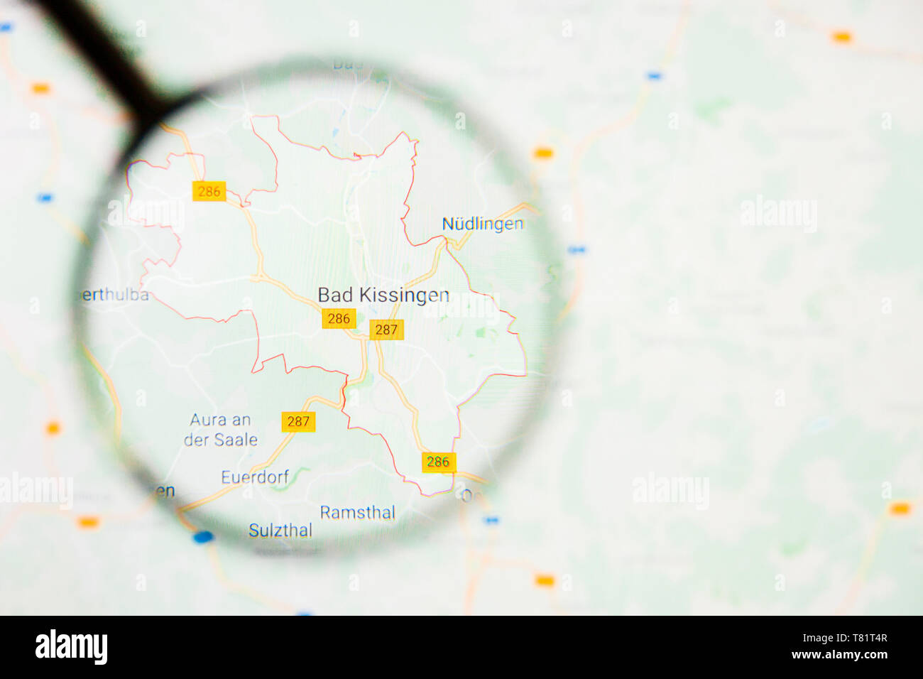Bad Kissingen city in Germany, Bavaria visualization illustrative concept on screen through magnifying glass Stock Photo