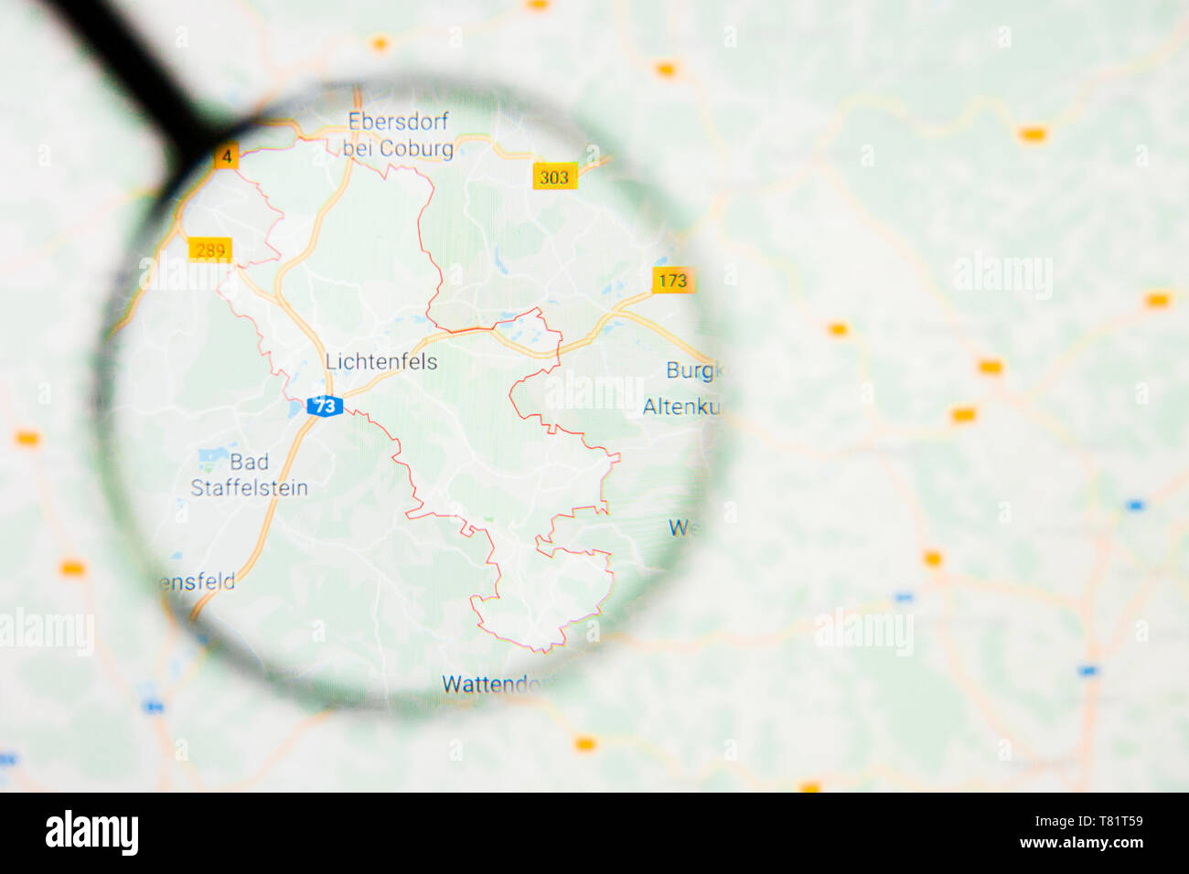 Lichtenfels city in Germany, Bavaria visualization illustrative concept on screen through magnifying glass Stock Photo