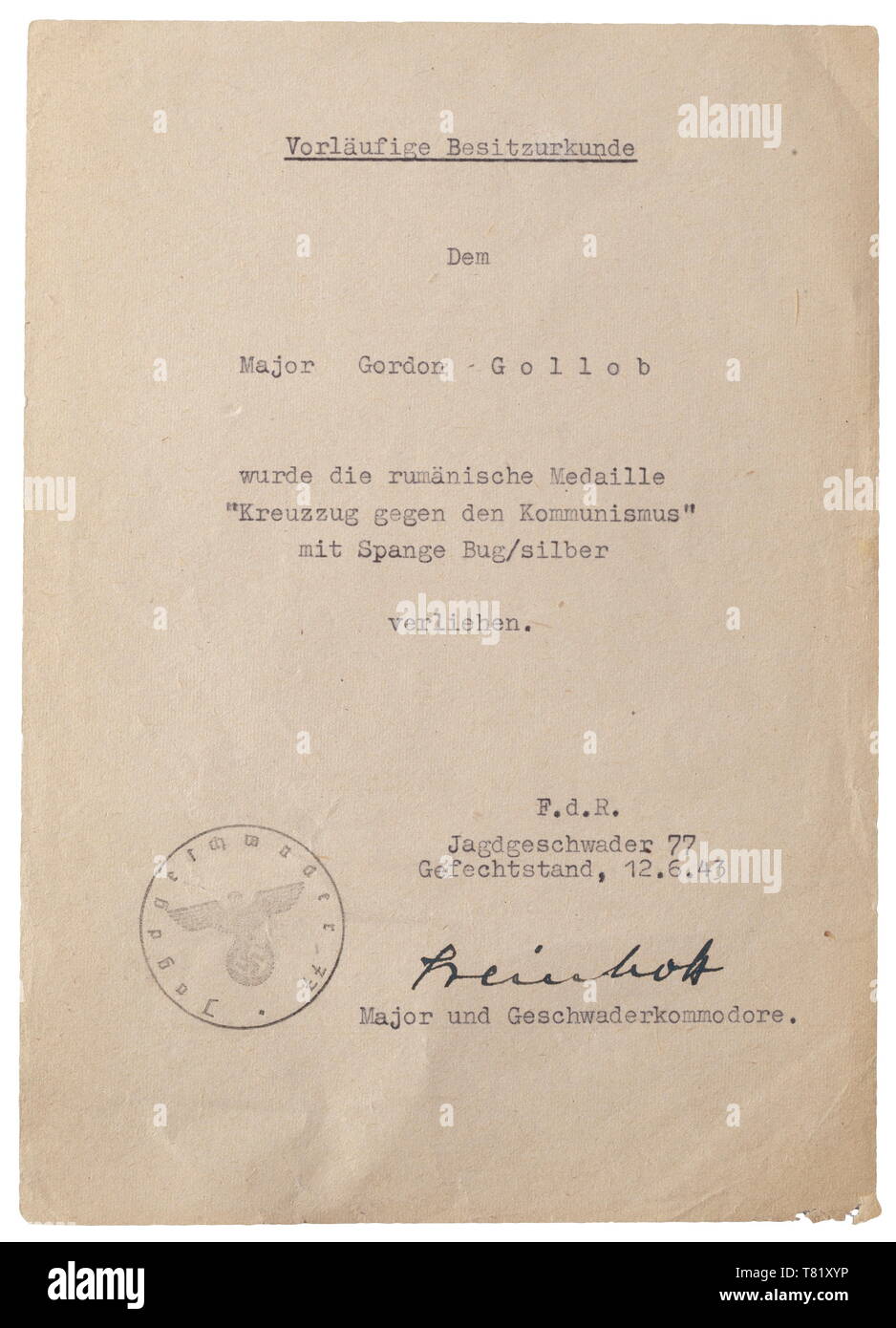 A typewritten preliminary possession document for the (tr) 'Rumanian Medal for the Crusade Against Communism with Bug Clasp/Silver', issued by Fighter Wing 77 on 12 June 1943 to Major Gordon Gollob, with original signature of Major and Wing Commander Johannes Steinhoff. historic, historical, Air Force, branch of service, branches of service, armed service, armed services, military, militaria, air forces, object, objects, stills, clipping, clippings, cut out, cut-out, cut-outs, 20th century, Editorial-Use-Only Stock Photo
