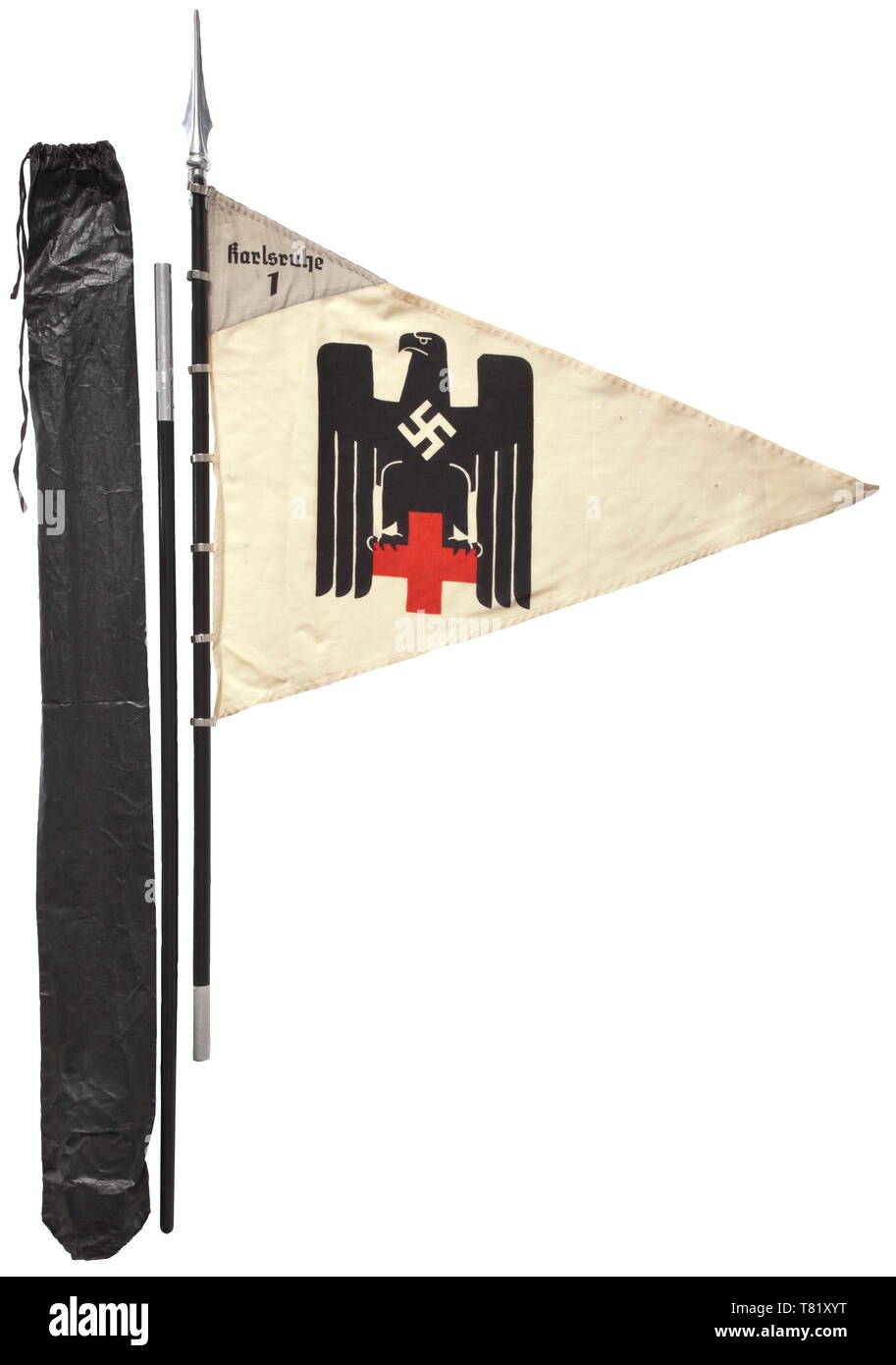 A pennant of the female detachment 'Karlsruhe 1' of white flag linen printed on both sides with a polychrome German Red Cross eagle Sewn, pennant-shape light grey face with black unit inscription. 70 x 90 cm. Colour-fresh, small moth holes. Complete with seven fastening rings, two-piece black wood pole, light metal finial and storage bag. Total height ca. 250 cm. historic, historical, Deutsches Red Cross, German Red Cross, organisation, organization, organizations, organisations, relief organization, relief organizations, object, objects, stills,, Additional-Rights-Clearance-Info-Not-Available Stock Photo