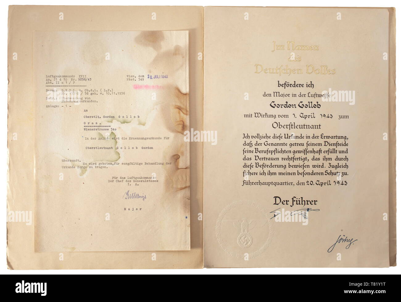 A promotion document to Oberstleutnant dated 20 April 1943 (effective 1 April) with stamped signatures of Hitler and Göring on a double page with transmittal letter from Luftgaukommando XVII. In a protective cover with inscription '626/7 Oberstleutnant Gordon Gollob Stab Jagdfliegerführer 3'. historic, historical, Air Force, branch of service, branches of service, armed service, armed services, military, militaria, air forces, object, objects, stills, clipping, clippings, cut out, cut-out, cut-outs, 20th century, Editorial-Use-Only Stock Photo