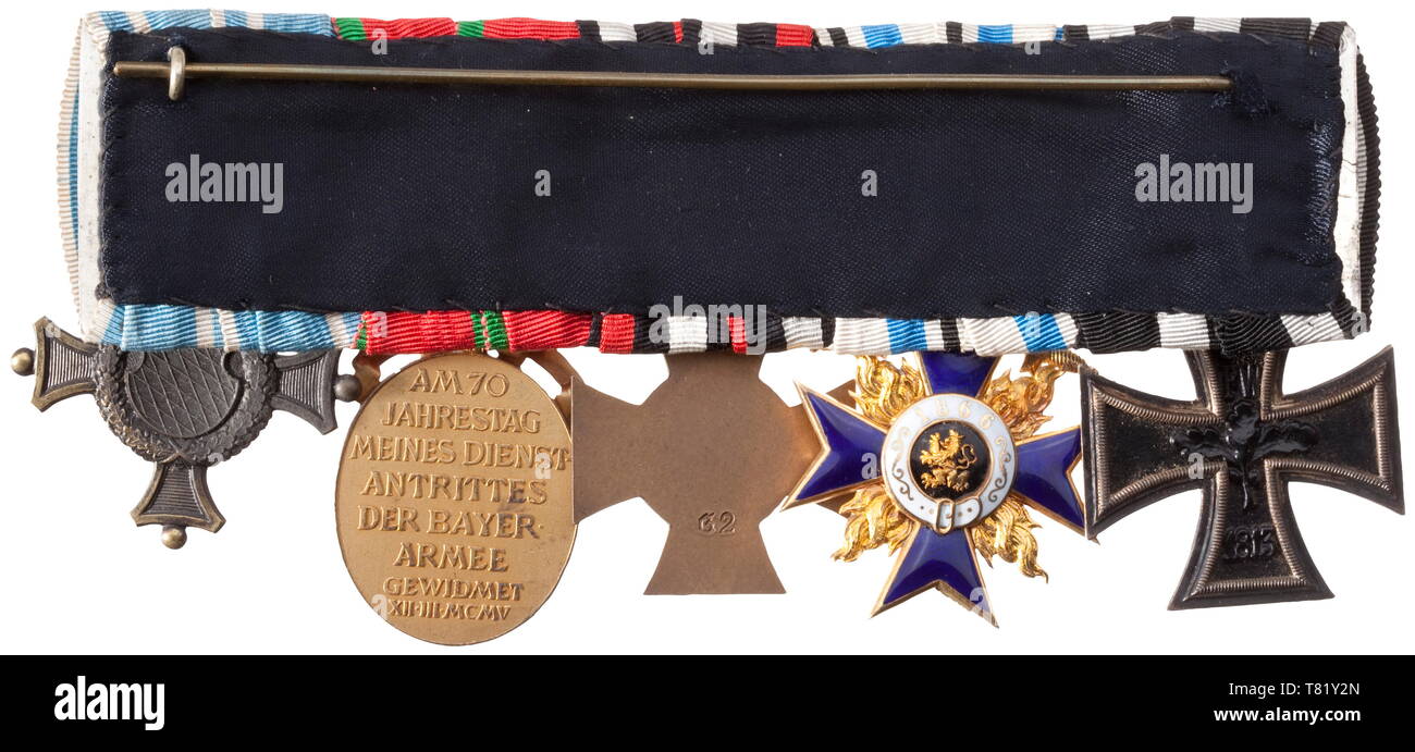 A large five-piece orders clasp. Iron Cross 2nd Class of 1914, Bavarian Military Merit Order 3rd Class made by Gebrüder Hemmerle, Munich, gold enamelled with separately inset flames, the lower cross arm with applied leaf 'Geb. H. 750', the screwed-on swords in red gold with maker 'G.H. 585', Cross of Honour for Front Fighters, Jubilee Medal with Crown and year ciphers 1839 - 1909, Long Service Award for 24 years of service. The Military Merit Order in very good condition. A beautiful, colour-fresh orders clasp of a Bavarian staff officer in fault, Additional-Rights-Clearance-Info-Not-Available Stock Photo