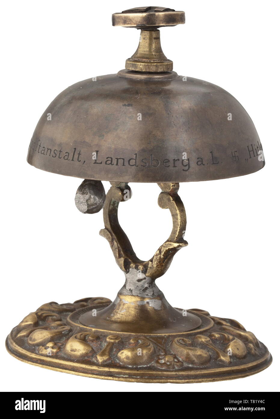 Adolf Hitler - a prison cell bell from fortress prison Landsberg on the Lech. An improvised gift made by his fellow inmates, of bronze parts of varying age, with a swastika bell push. The bell is engraved 'Hitlerglocke' aus der Strafzelle No. 7 Festungshaftanstalt Landsberg a.L. ("Hitler Bell" from penal cell no. 7 fortress prison Landsberg on the Lech). Height ca. 9 cm. historic, historical, 20th century, 1930s, NS, National Socialism, Nazism, Third Reich, German Reich, Germany, German, National Socialist, Nazi, Nazi period, fascism, Editorial-Use-Only Stock Photo