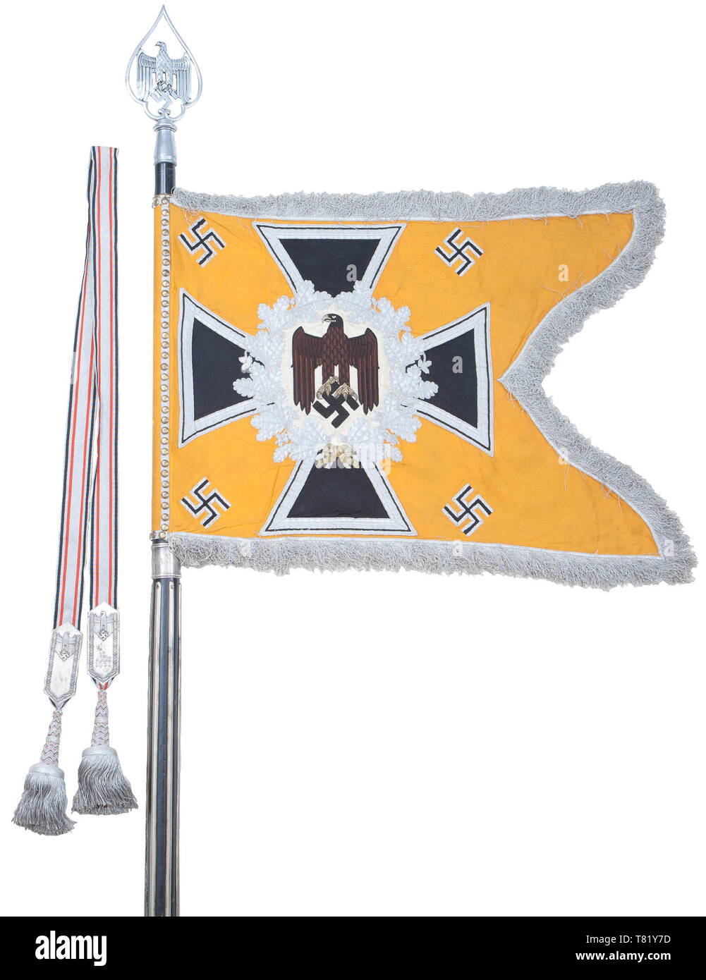 A standard of the 1st Battalion of the 6th Schützen Cavalry Regiment. Bright yellow/orange coloured silk cloth. Obverse and reverse hand-embroidered black army eagle with its feathers set off in brown. Beak and talons rendered in raised gold embroidery, on a field of cream-coloured silk, surrounded by an embroidered silver oak leaf wreath on an Iron Cross. Four applied swastikas in the corners. Silver fringe on three sides. Dimensions ca. 51 x 69 cm (without pole sleeve). 46 attachment nails (worn by polishing), backed by silver tress. Black poli, Additional-Rights-Clearance-Info-Not-Available Stock Photo