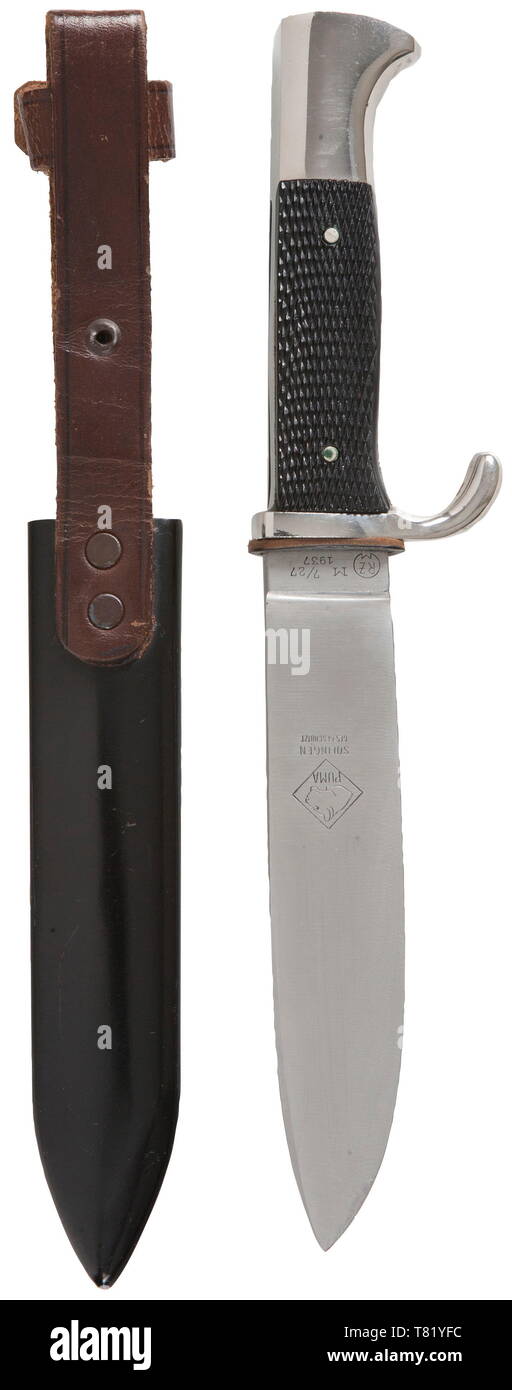A Hitler Youth knife with motto etching. Maker Puma, Solingen. The blade  with etched motto and manufacturer's trademark and "RZM M 7/27 1937".  Plated hilt, black plastic grip plates with enamelled HJ