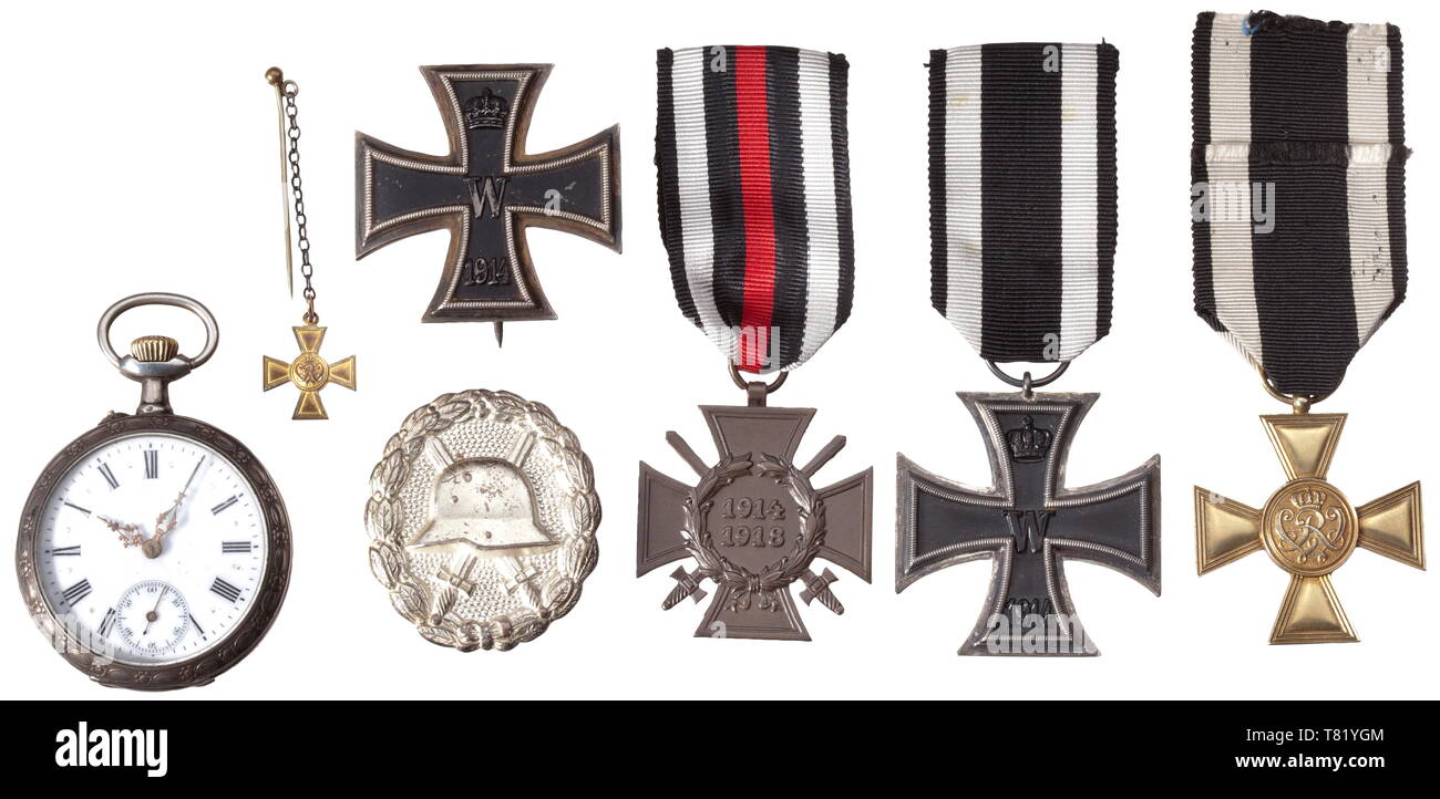 A decorations group of Acting Officer Ihno Ihnen, winner of the Prussian Golden Military Merit Cross (the Pour le Mérite for enlisted men). The Merit Cross in gilt silver issue typical of World War awards, according to the ordinance with 'W 938' punch of the Wagner firm in Berlin. The gilding on this lightly used example is in excellent condition and is only slightly oxidised. Included is a used Iron Cross 1st Class of 1914 in silver issue of maker â€œKOö wit 20th century, Additional-Rights-Clearance-Info-Not-Available Stock Photo