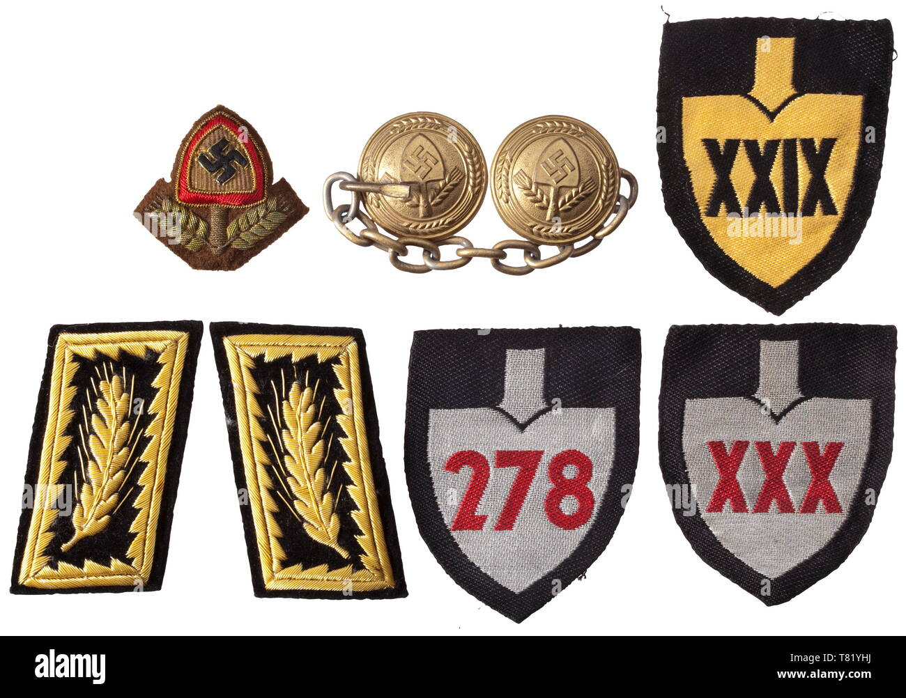 Generalarbeitsführer Herbert Riester - insignia for the RAD uniform. Collar patches in the rank of a Generalarbeitsführer, cellon on black velvet. Gold-embroidered national emblem for the (tr) 'coffee bean' (coll. for a special type of service cap), gold-woven district spade of section 'XXIX' and a clasp of gilt aluminium (prong missing) for the cloak called (tr) 'Spaniard'. Included are two further district spades for RAD leaders. Also cf. the other lots from the Riester estate. historic, historical, Reichsarbeitsdienst, Reich Labor Service, State Labour Service, organisat, Editorial-Use-Only Stock Photo