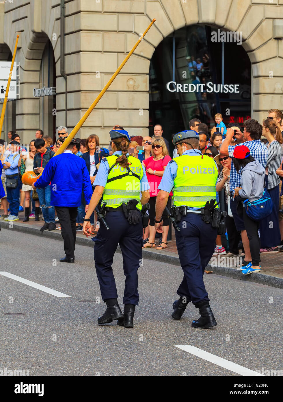 Zurich, Switzerland - August 1, 2016: policemen on duty during the parade devoted to the Swiss National Day passing along Uraniastrasse street in the  Stock Photo