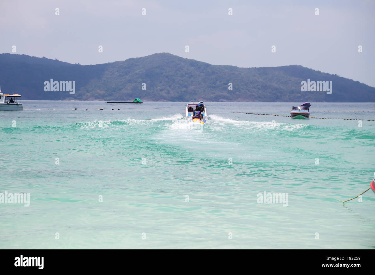 Summertime at Raya Island, Phuket, Thailand and so many tourists from