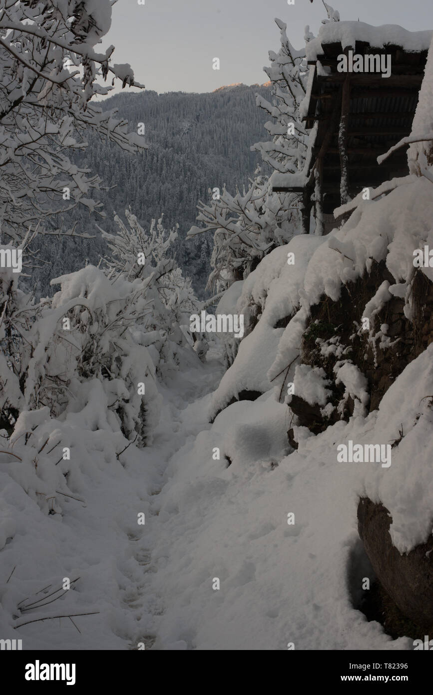 Snow covered wooden house in mountains - Majestic winter landscape in ...