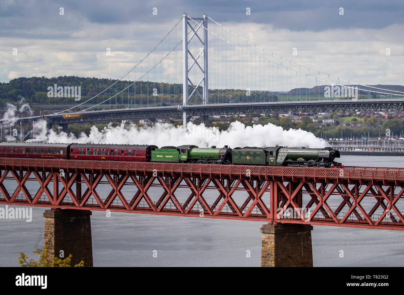The Flying Scotsman steam train crosses the Forth Bridge on its way from Edinburgh to Inverness