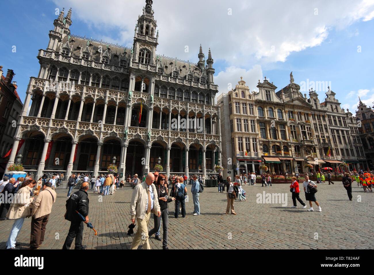 BRUSSELS, BELGIUM - AUGUST 25, 2008: People visit Grand Place view in Brussels, Belgium. Grand Place is a UNESCO World Heritage Site. It features old  Stock Photo