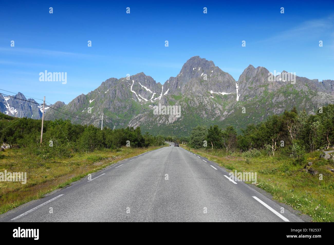 Road in Lofoten, Norway - mountain landscape in Austvagoya island. Stock Photo