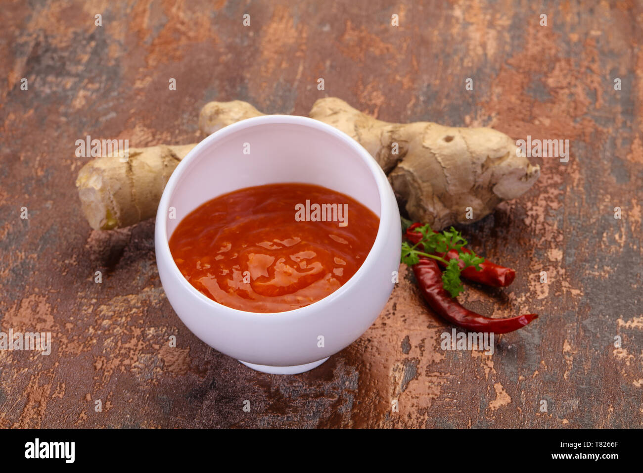 Ginger chili sauce with root and pepper Stock Photo - Alamy