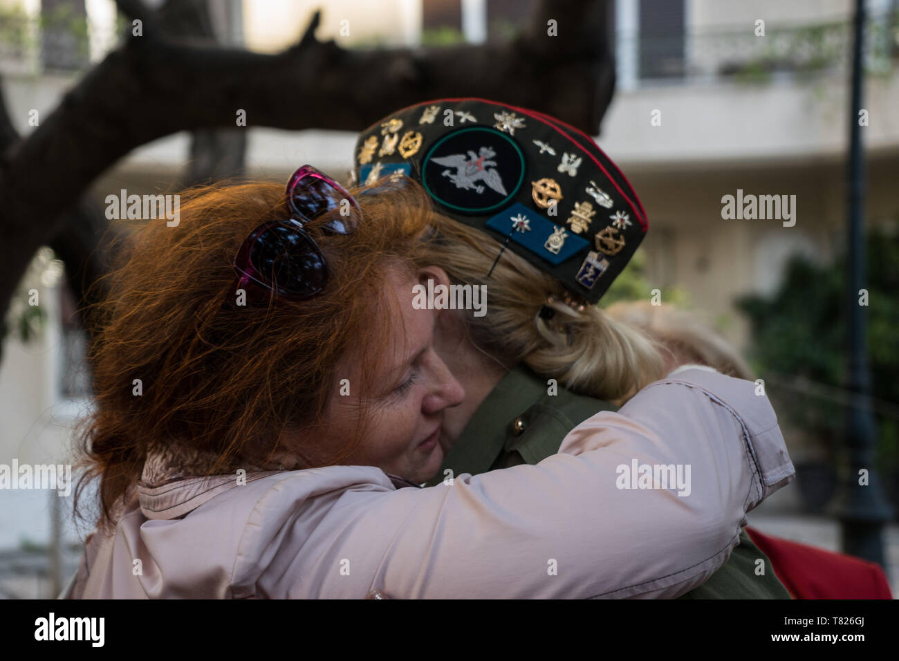 Two women seen hugging during the celebration. Participants celebrated the 74th anniversary for the victory over the Nazis by USSR in World War II by taking part in an Immortal Battalion march. Participants paraded with pictures of their relatives who lost their life in the war to honour them. Stock Photo