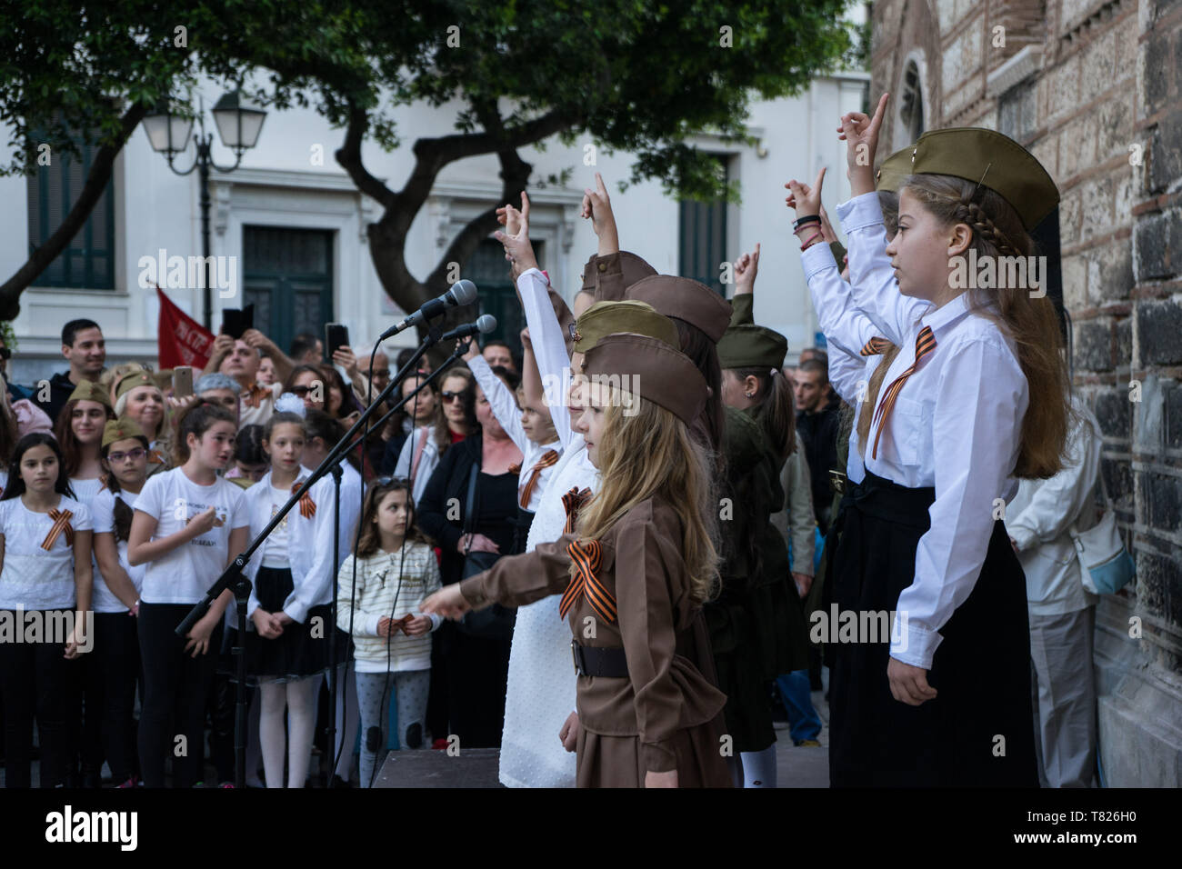 A choir of children seen singing during the celebration. Participants celebrated the 74th anniversary for the victory over the Nazis by USSR in World War II by taking part in an Immortal Battalion march. Participants paraded with pictures of their relatives who lost their life in the war to honour them. Stock Photo