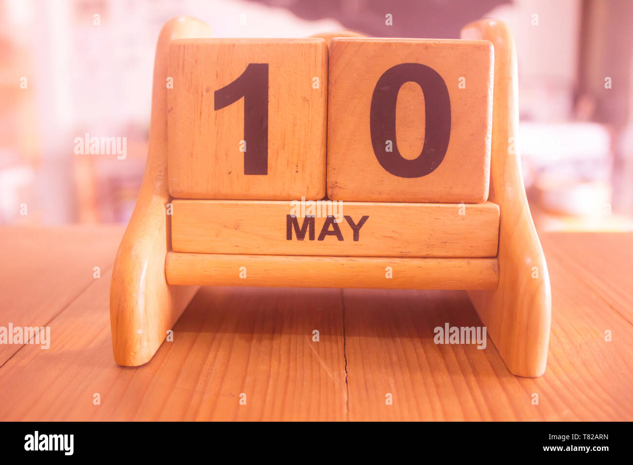 calendar of date on 10th may make by wooden template background Stock Photo