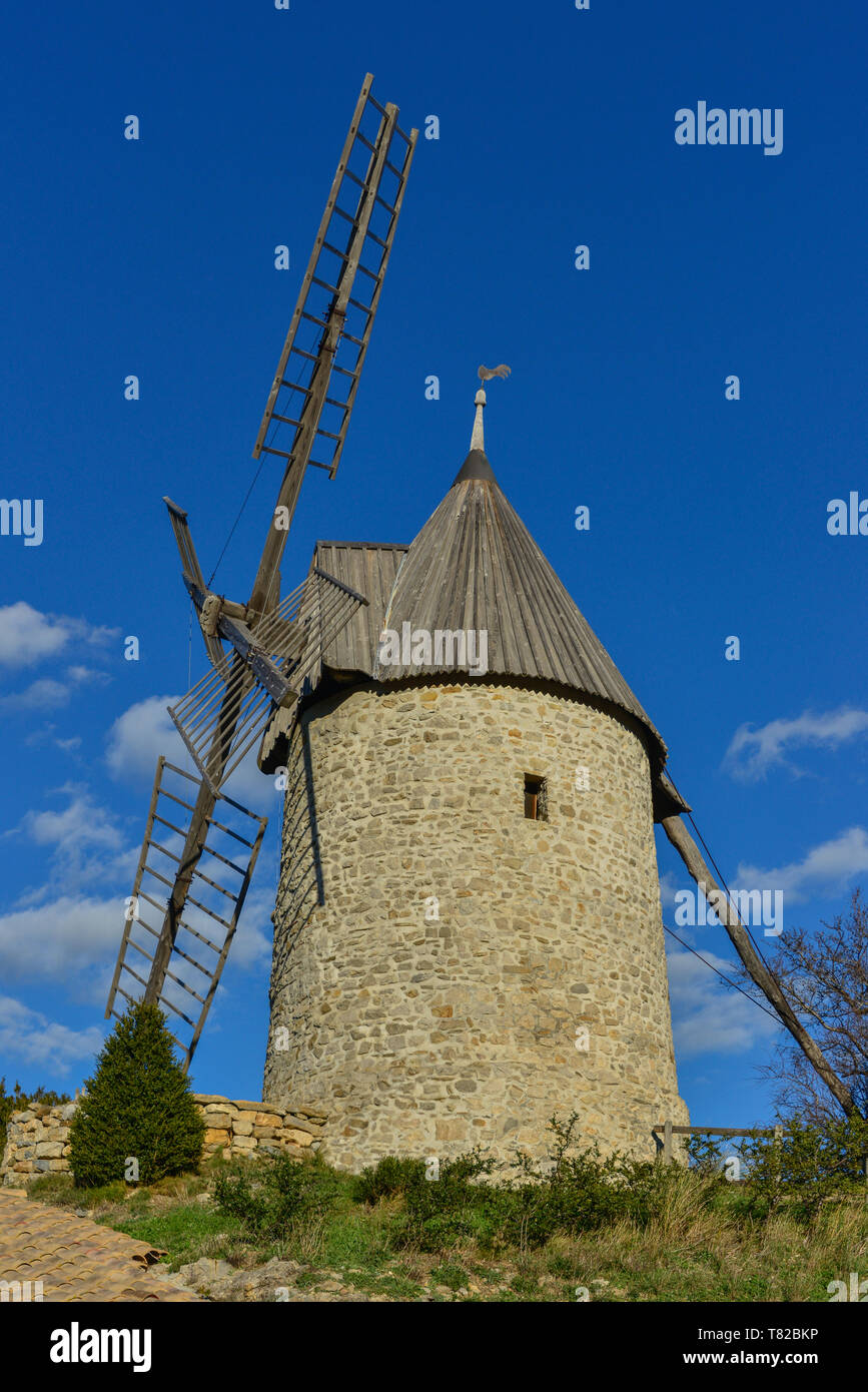 The restored Moulin d'Omer, in the small village of Cucugnan, Pyrenees Orientales, France. This windmill grinds flour for the nearby bakery. Stock Photo