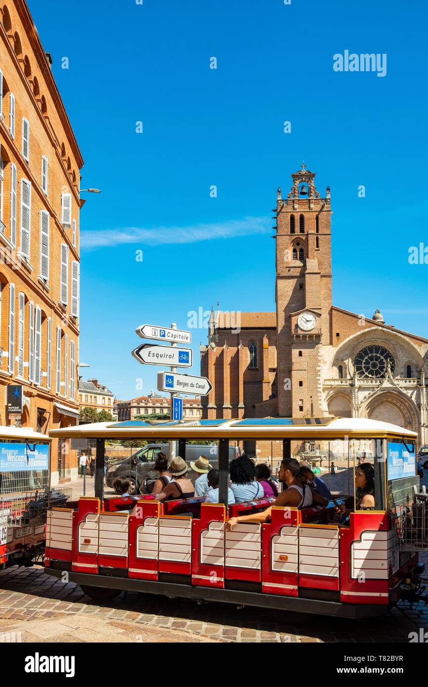 France, Haute Garonne, Toulouse, small tourist train in front of Saint Etienne cathedral Stock Photo