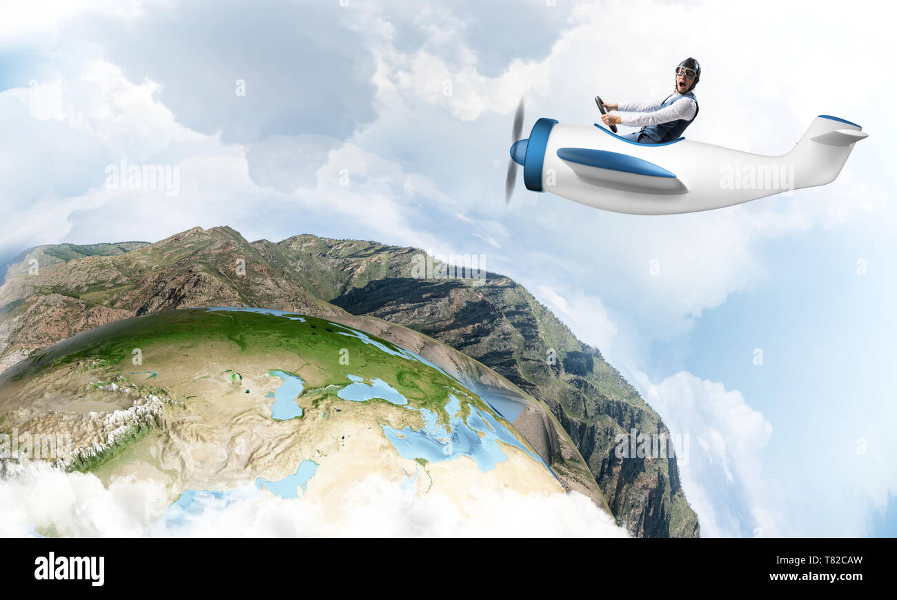 Happy pilot driving small propeller plane Stock Photo Alamy