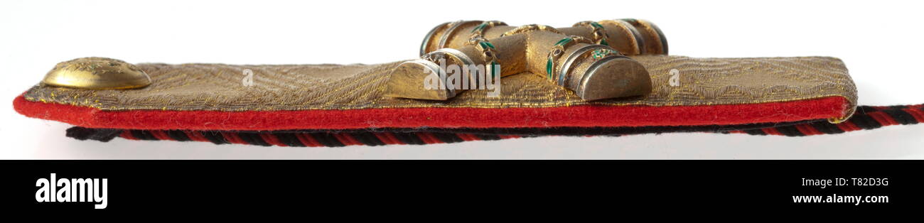 Field marshal shoulder boards for the uniform of a Colonel Proprietor, probably of the Russian Kexholmski Foot Guard Regiment. The shoulder boards with applied silver coloured, partially gold plated and enamelled crossed marshal's batons on gold lace (slightly darkened), red cloth backing, black tongue. Golden double eagle buttons. The shoulder boards at hand supposedly belonged to Kaiser Franz Joseph I of Austria (1830 - 1916). Following his rise to the throne on 28th December 1848, Kaiser Franz Joseph I was the honorary proprietor of this regim, Additional-Rights-Clearance-Info-Not-Available Stock Photo