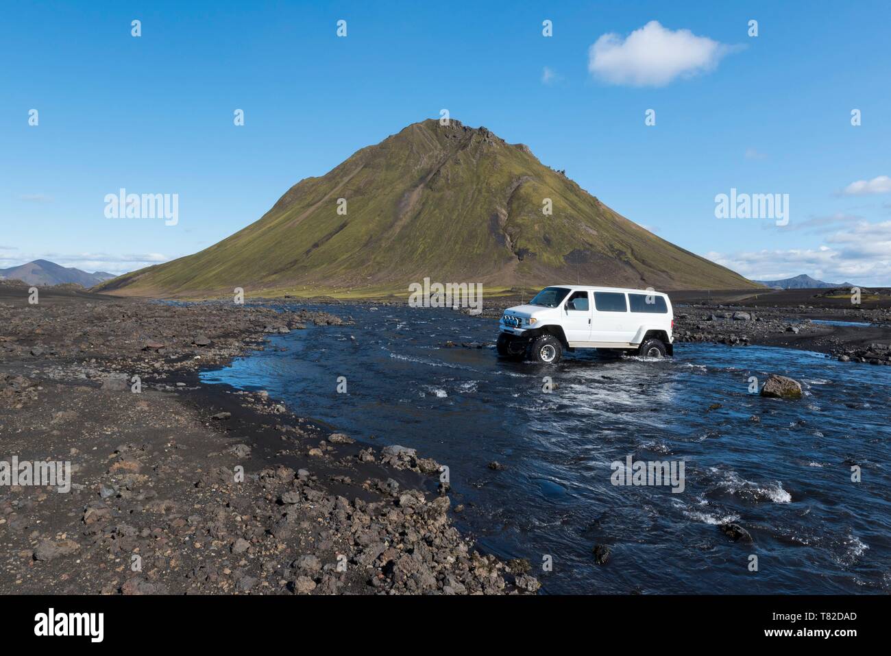 Iceland, South Iceland, Sudurland Region, Fjallabak Sydri, 4x4 crossing a glacial river, Maelifell mount Stock Photo