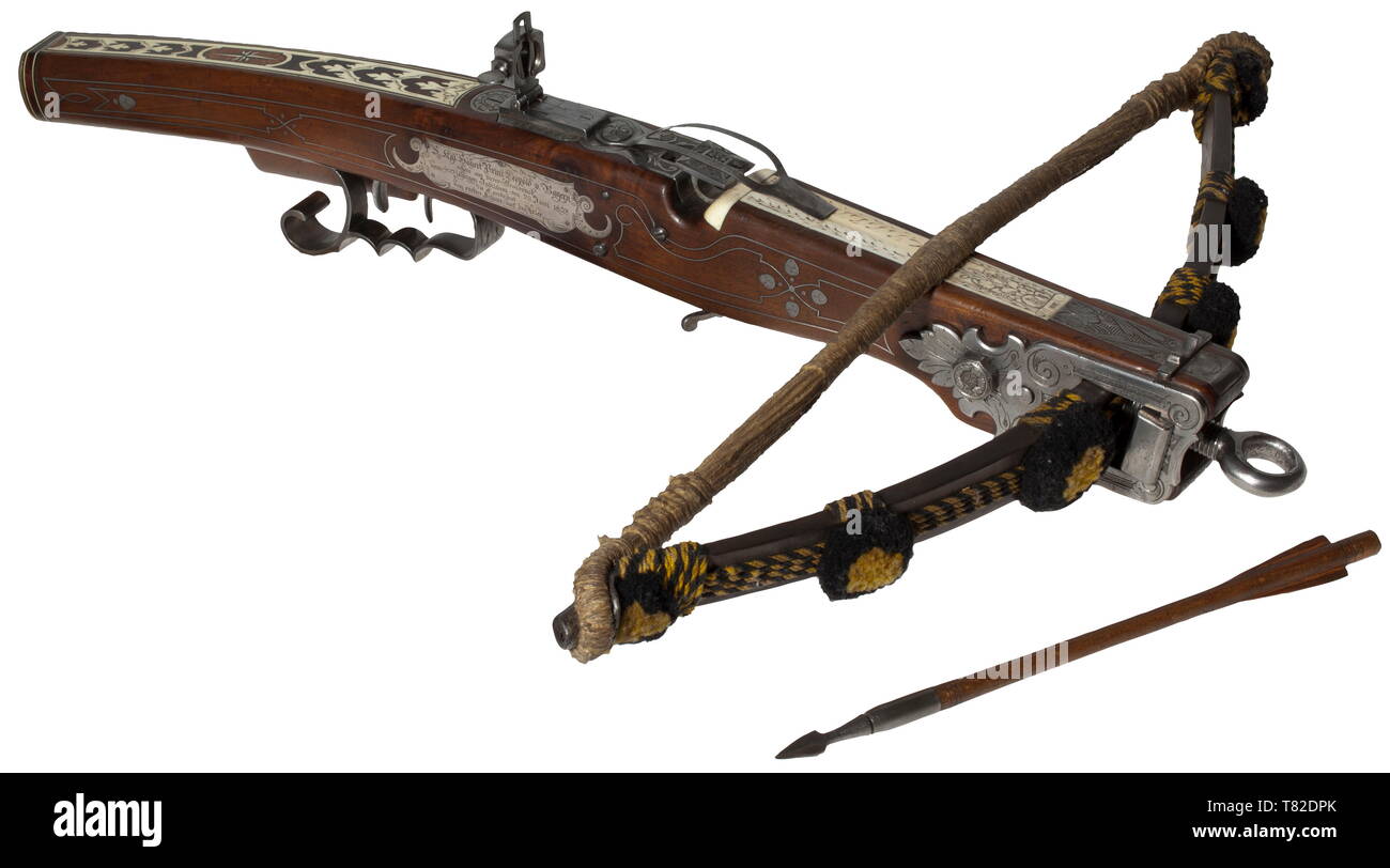 Prince Leopold of Bavaria - a crossbow for shooting at a wooden bird (Vogelarmbrust), Höhnlein in Munich, dated 1893 Heavy, screwed steel prod with woollen tassels in the colours of the city of Munich yellow and black, and braided string. The tiller with lavishly engraved iron fittings with tendril and strap decorations as well as silver 19th century, Additional-Rights-Clearance-Info-Not-Available Stock Photo