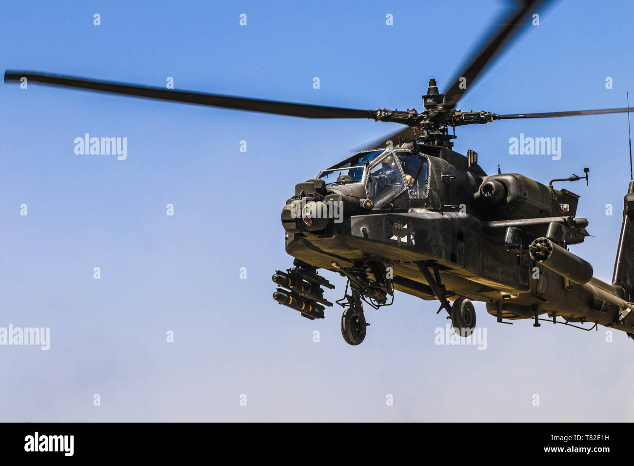 An AH-64 Apache soars through the sky here in Afghanistan providing mission essential aviation support for Operation Freedom’s Sentinel and Resolute Support. Stock Photo