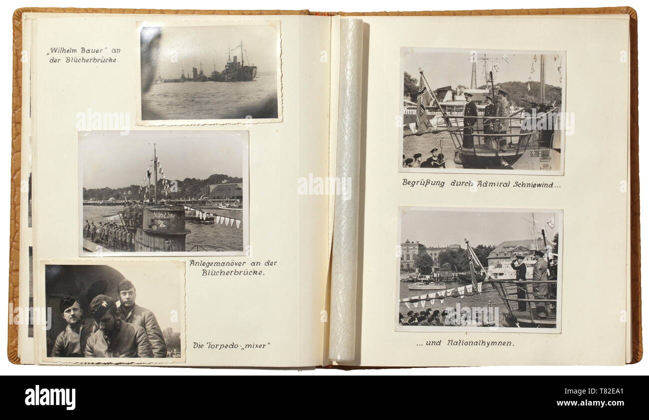 A photo album of Petty Officer 2nd Class Alex Hübner, crew member of U-48, U-167, U-775 The beautifully captioned album with circa 174 excellent photos from his time of service from 6 April 1940 to 8 May 1945. Very good pictures of the technical features of the submarines, with victory pennants, tower malings and superstructure. Pictures of commanders with the Knight's Cross of the Iron Cross such as Lieutenant Schultze and Lieutenant Commander Rösing, torpedo transfer, sinking of ships with torpedoes and the ship's gun, portraits, submarine pen. Submarine sailor A. Hübner , Editorial-Use-Only Stock Photo