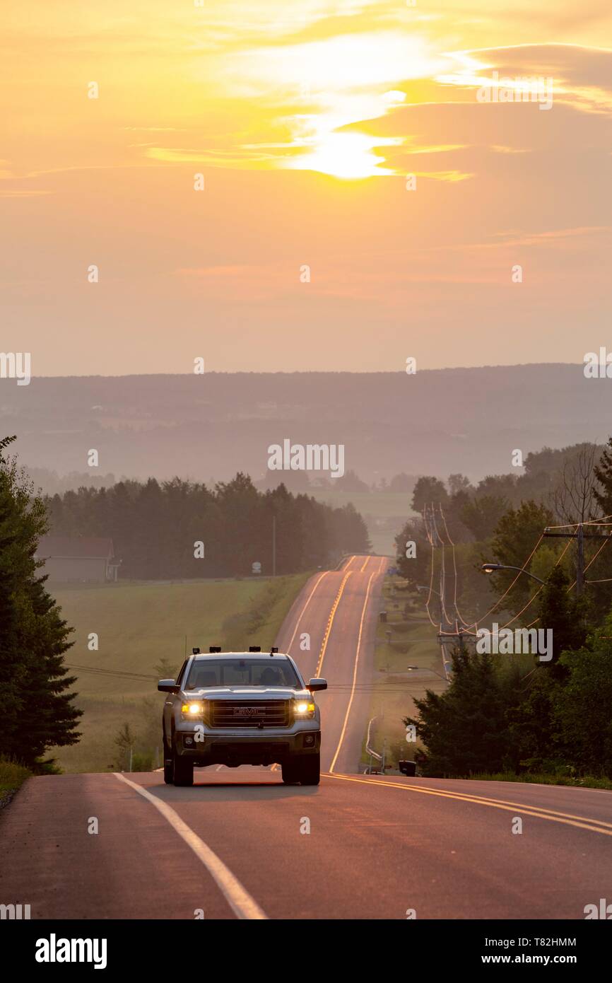 Canada, Province of Quebec, Eastern Townships Region or Estrie, Coaticook Road at Sunrise Stock Photo