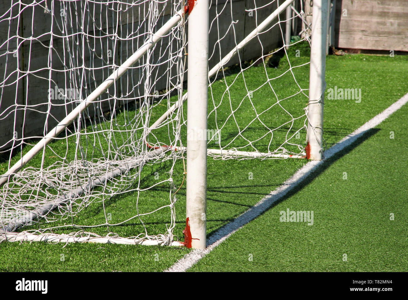 Part of soccer goal door with white net. Close up for football goal at ...