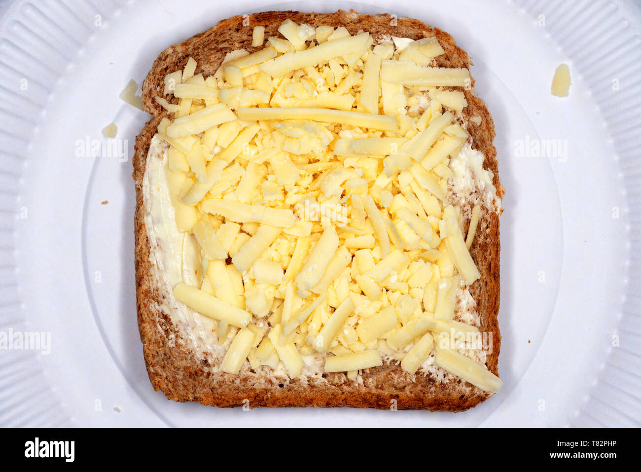 Grated cheddar cheese with Branston pickle on wholemeal bread Stock